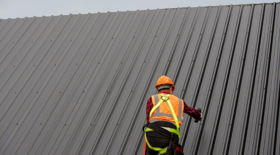 Professional metal roof installation services in Macksburg, IA